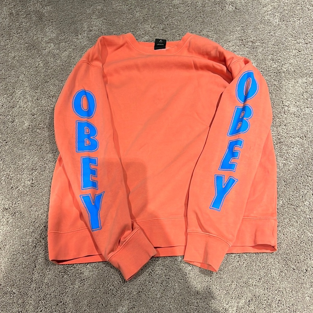 Obey Coral Sweatshirt with Blue Lettering
